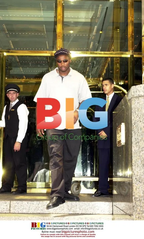 Boxer Lennox Lewis outside Trump Hotel in NYC