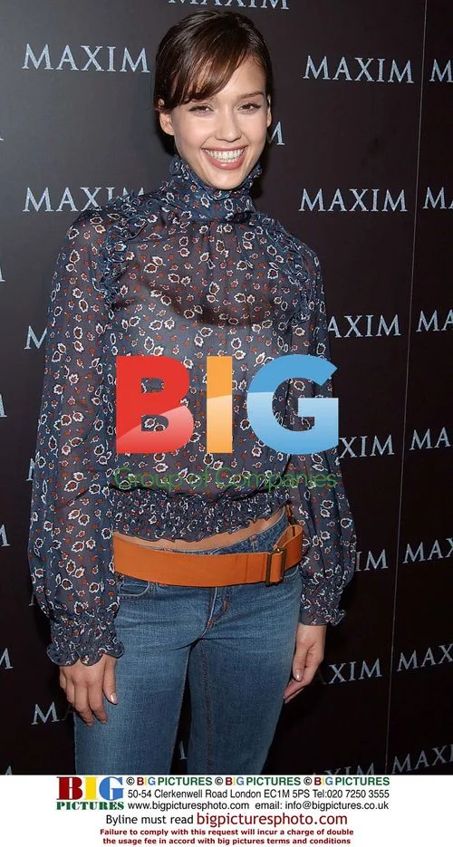 Fashion Icon Poses on Red Carpet