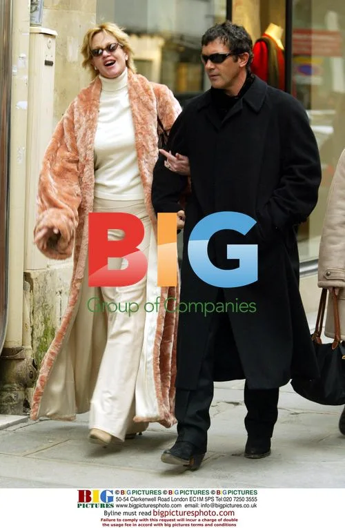 Celebrity in fur coat and sunglasses