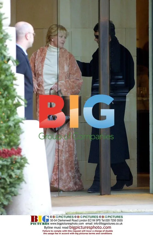 Celebrity in Long Fur Coat