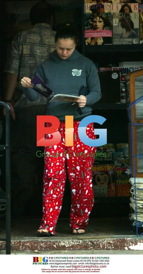 Christina Ricci Checks Magazine at News Stand