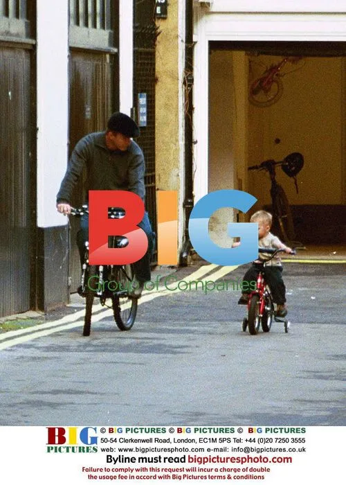 Guy Ritchie and son Rocco on bikes