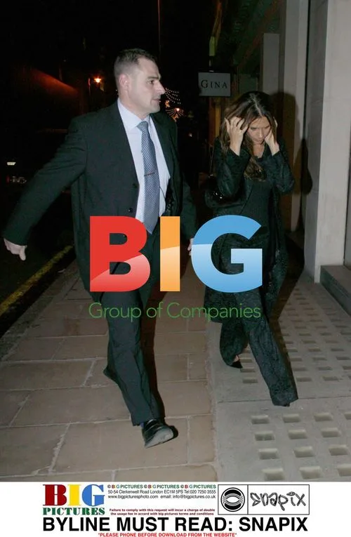 Victoria Beckham with Bodyguard in Central London