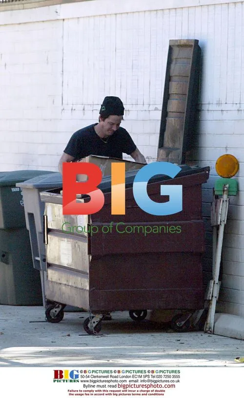 Keanu Reeves Takes Trash, Finds Box