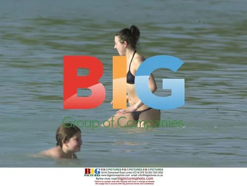 Mel C Enjoys Swim with Boyfriend