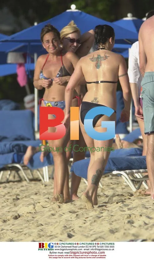 Mel C Enjoying a Swim with Boyfriend