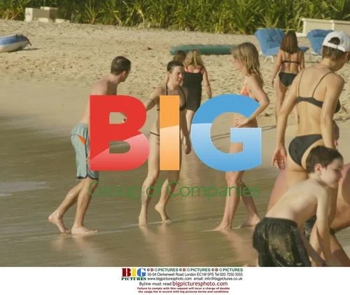 Mel C Enjoys Swim with Boyfriend in Barbados