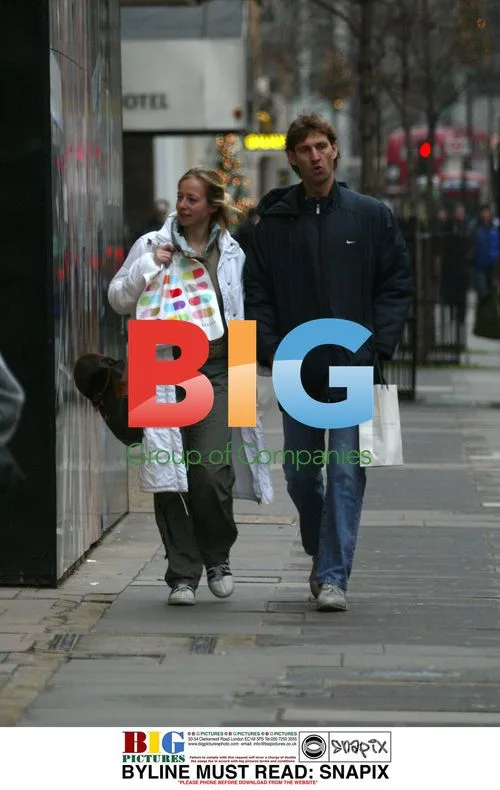 Tony Adams and Girlfriend Shopping in London