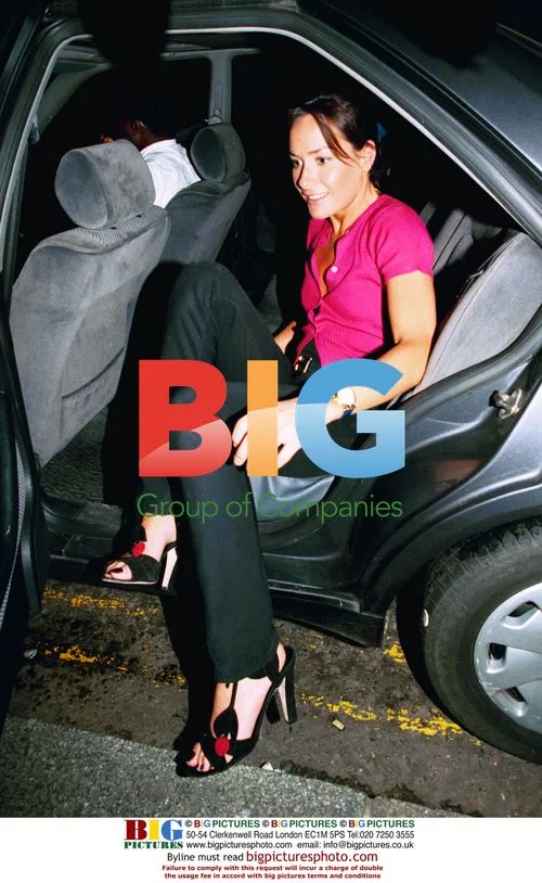 Tara Palmer-Thompkinson in black and pink