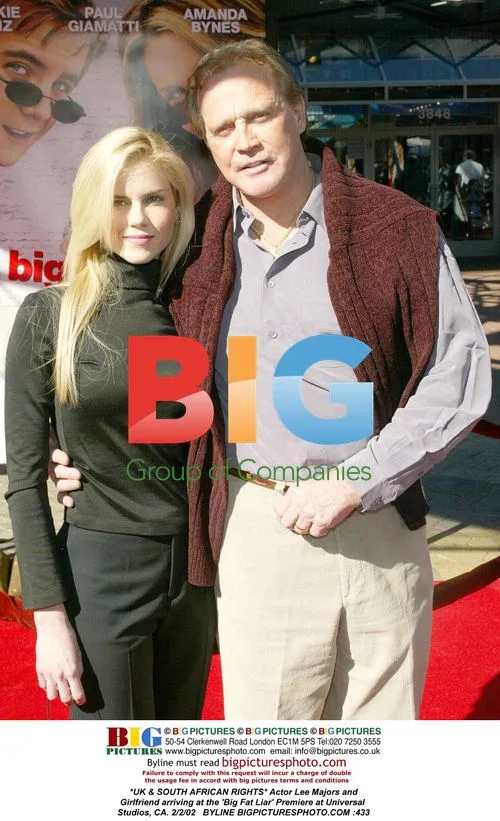 Lee Majors and Girlfriend at 'Big Fat Liar' Premiere