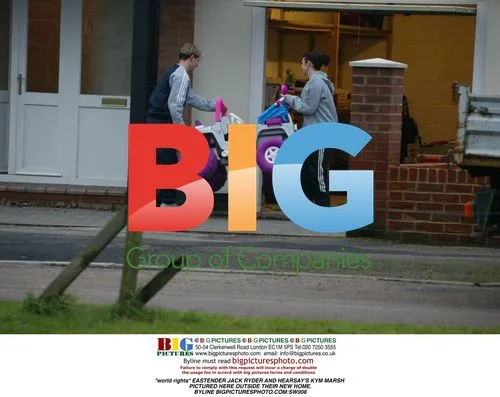 Jack Ryder and Kym Marsh outside their new home