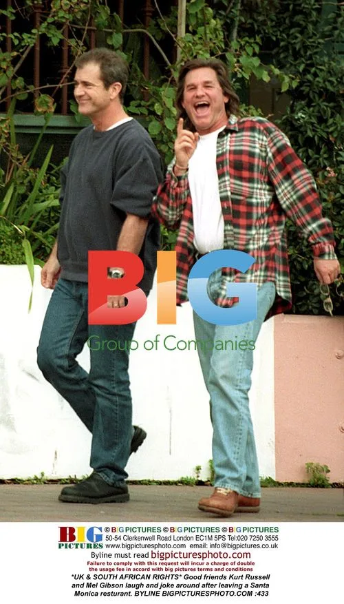 Kurt Russell and Mel Gibson Laugh After Dinner
