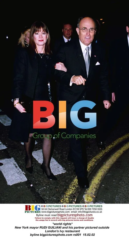 Rudi Guiliani and partner outside London's Ivy