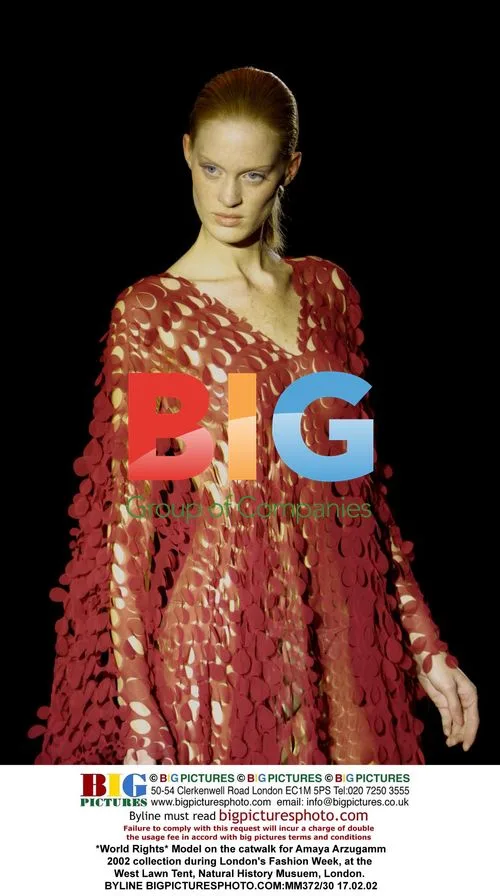 Model on catwalk for Amaya Arzugamm collection