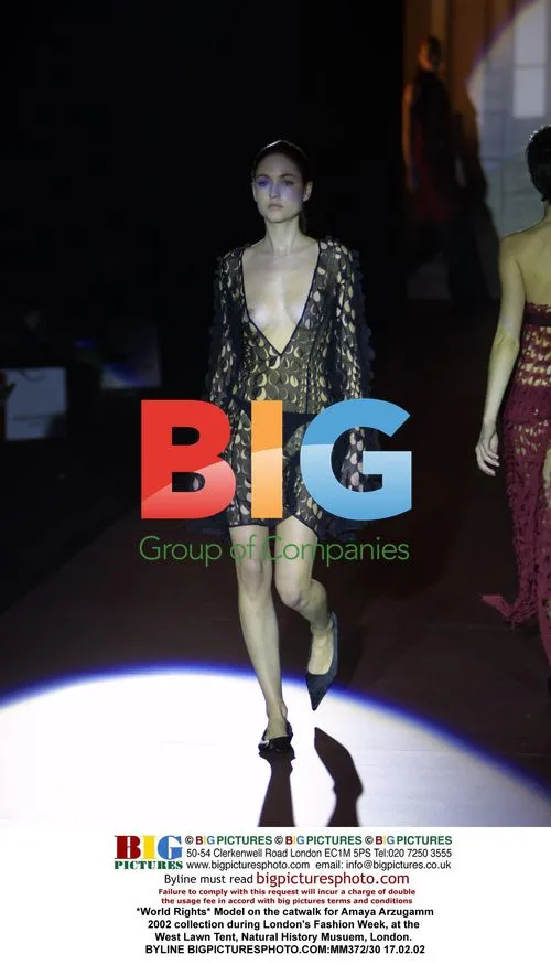 Model on catwalk for Amaya Arzugamm 2002 collection