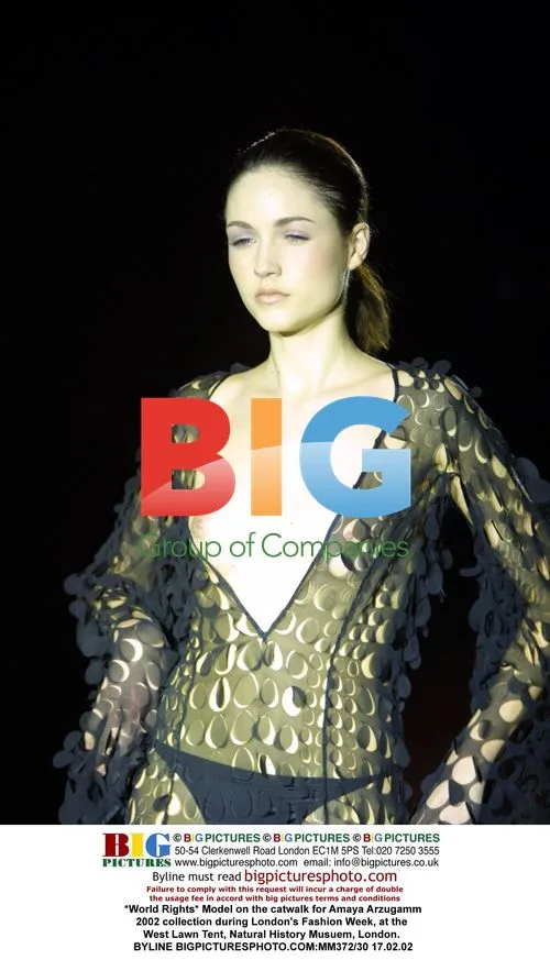 Model on catwalk for Amaya Arzugamm 2002 collection