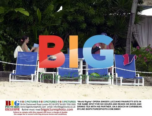 Pavarotti Reads on Caribbean Beach