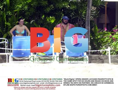 Pavarotti Relaxing on Caribbean Beach