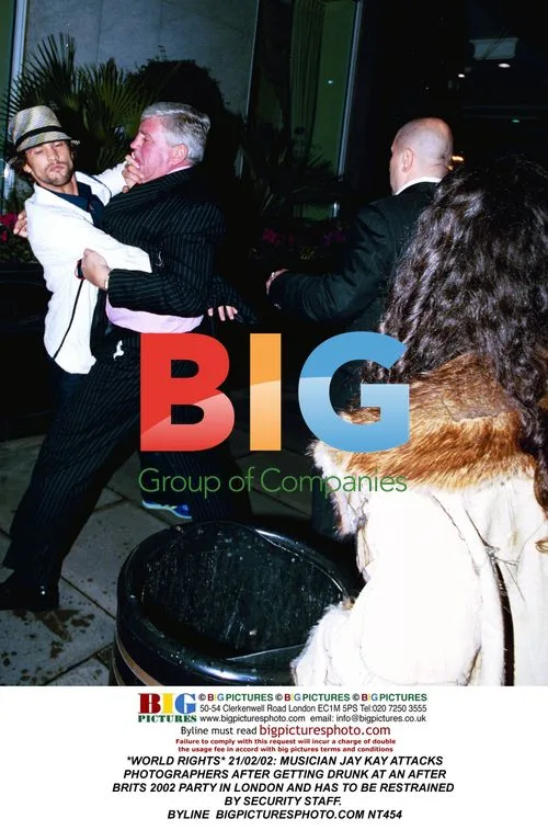 Jay Kay Attacks Photographers at Brits 2002 Party