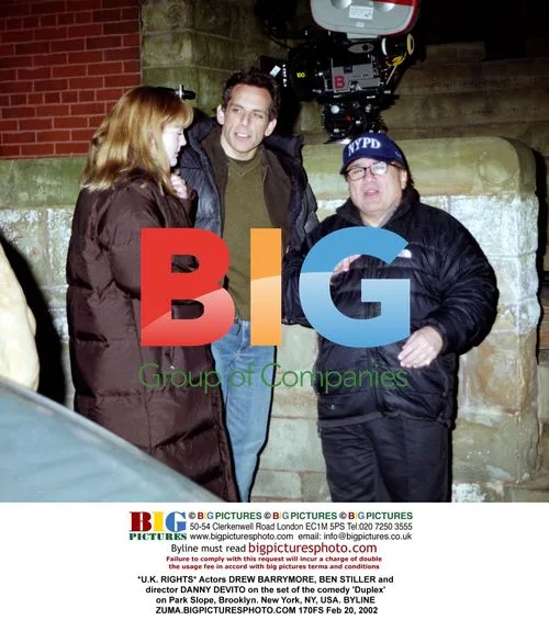Actors and director on 'Duplex' set