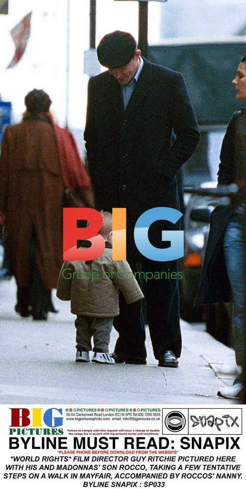 Guy Ritchie and son Rocco take walk in Mayfair