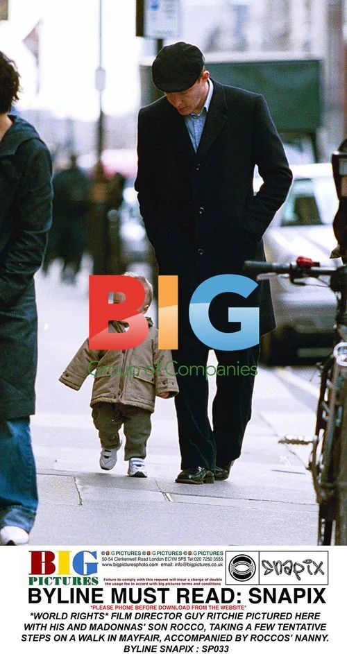 Guy Ritchie and son Rocco out for walk in Mayfair