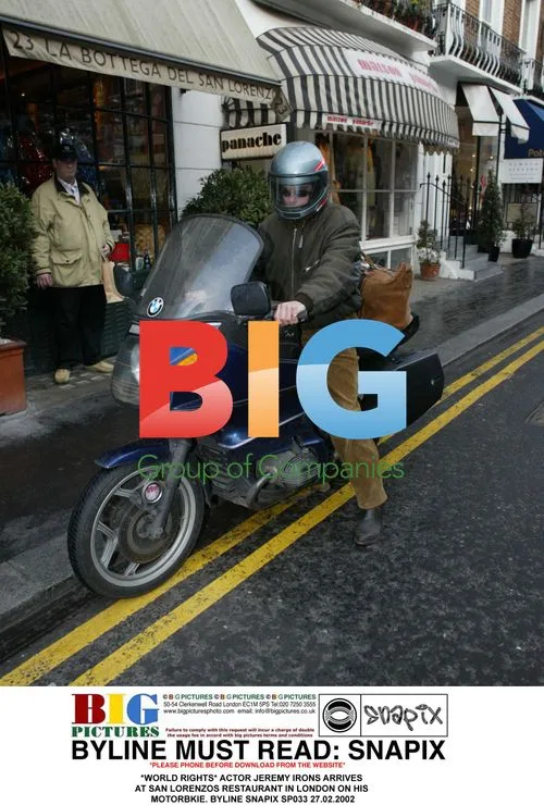 Jeremy Irons arrives at San Lorenzo's on motorbike