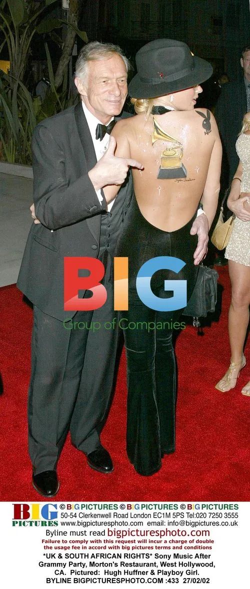 Hugh Huffner & Playboy Girl at Grammy Party