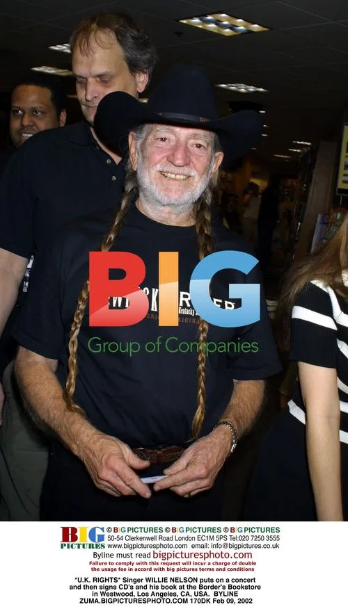 Willie Nelson signs CD's and book at Westwood, LA