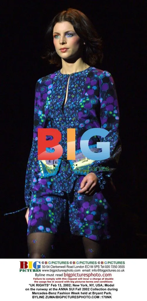 Model walks ANNA SUI Fall 2002 runway