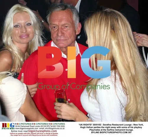 Hugh Hefner Parties with Playmates