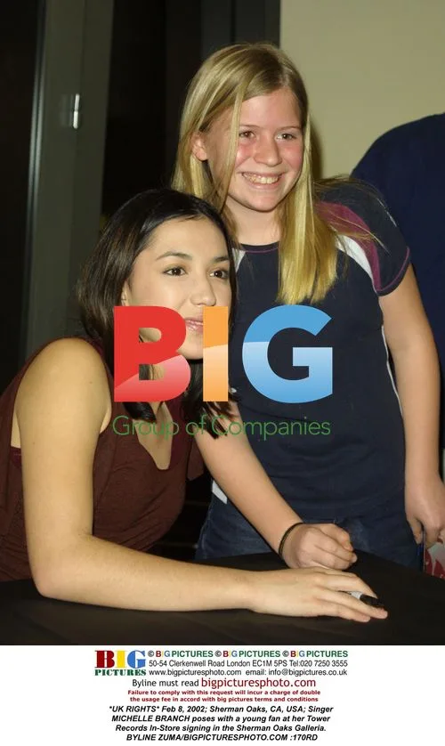 Michelle Branch Poses with Fan at Tower Records Signing