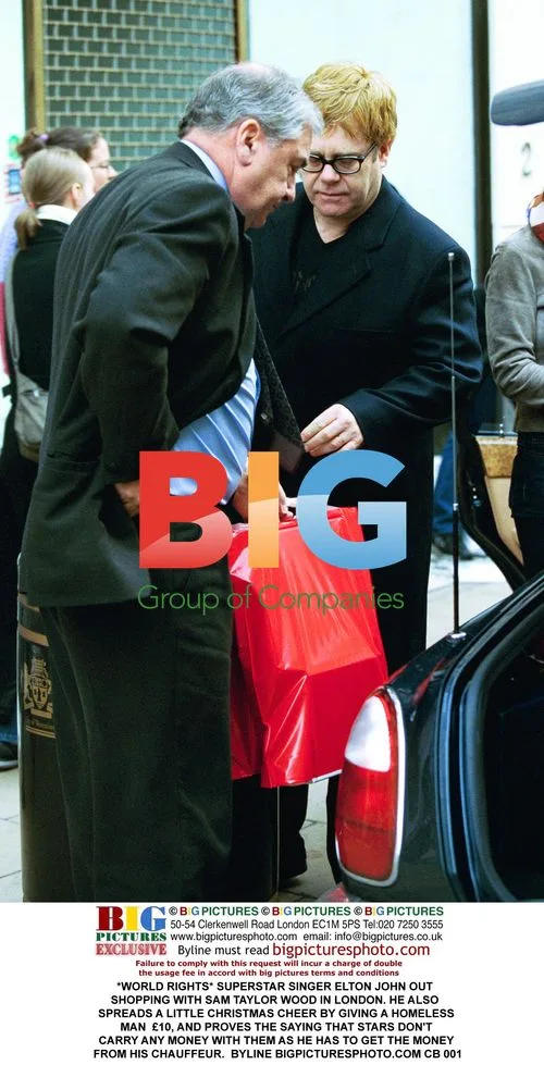 Elton John Out Shopping with Sam Taylor Wood