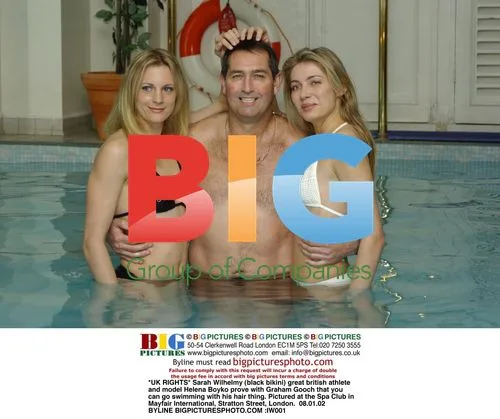 Sarah Wilhelmy and Helena Boyko swim with Graham Gooch