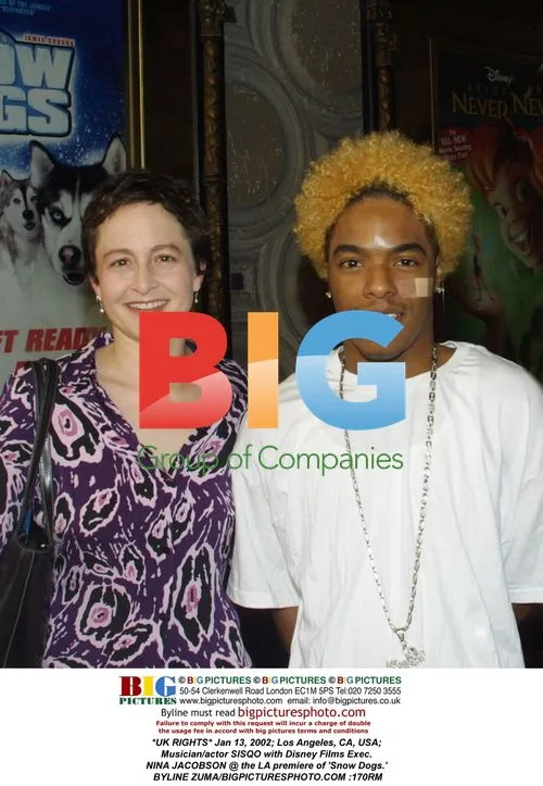 Sisqo and Nina Jacobson at 'Snow Dogs' premiere
