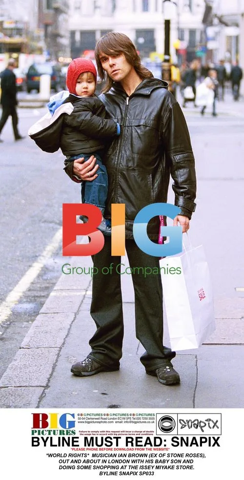 Ian Brown Out Shopping with Baby Son