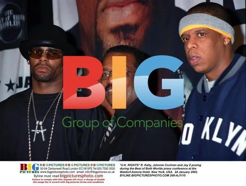 R. Kelly, Johnnie Cochren and Jay Z at press conference