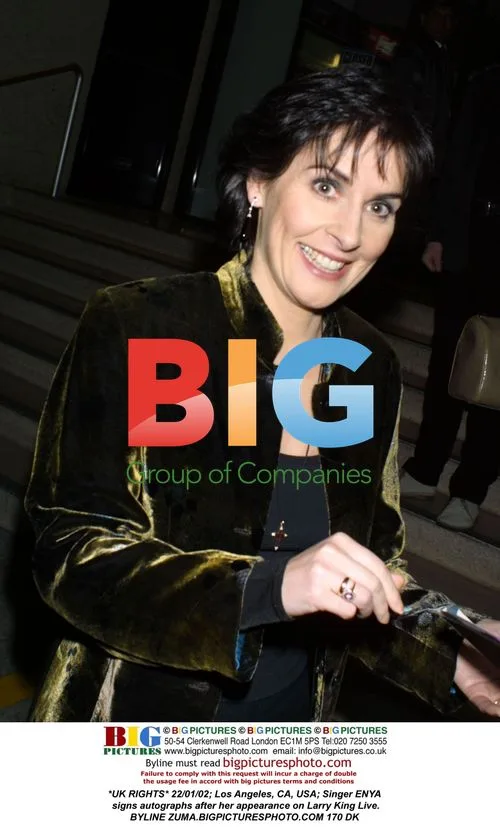 ENYA signs autographs after Larry King Live