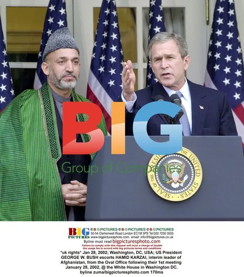 Bush Escorts Karzai from Oval Office