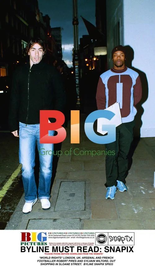 Arsenal Footballers Pires and Wiltord Shopping in London