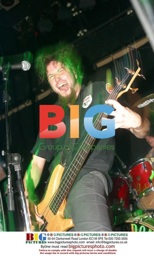 Troy Sanders of Mastodon performing