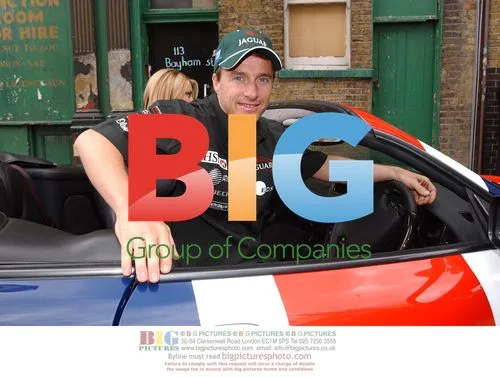 Eddie Irvine and Nickie Theobald with Austin Powers Car