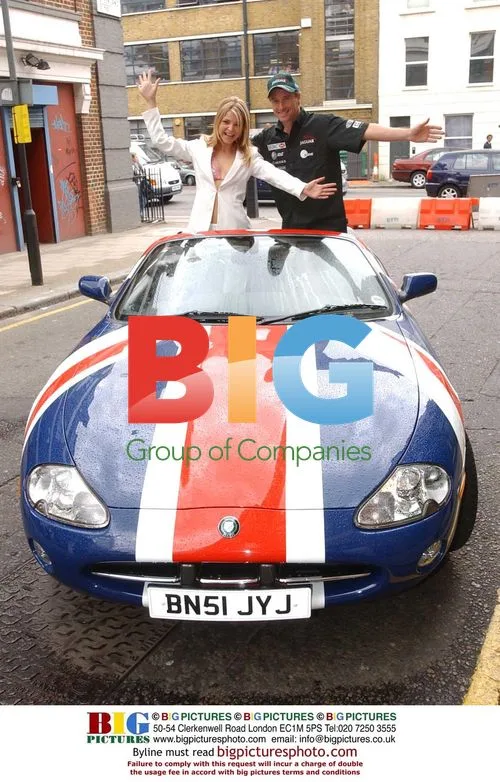 Eddie Irvine and model Nickie Theobald at gallery