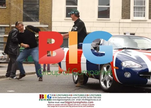 Eddie Irvine and Nickie Theobald with Austin Powers Car