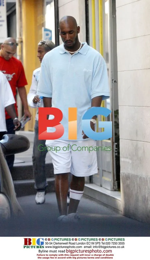 Nicolas Anelka in Paris with injury support