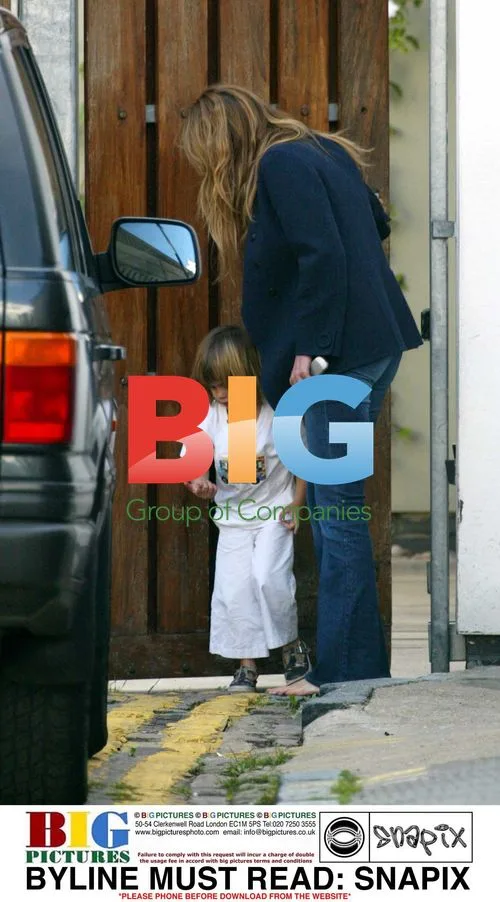 Elle McPherson Out in North London