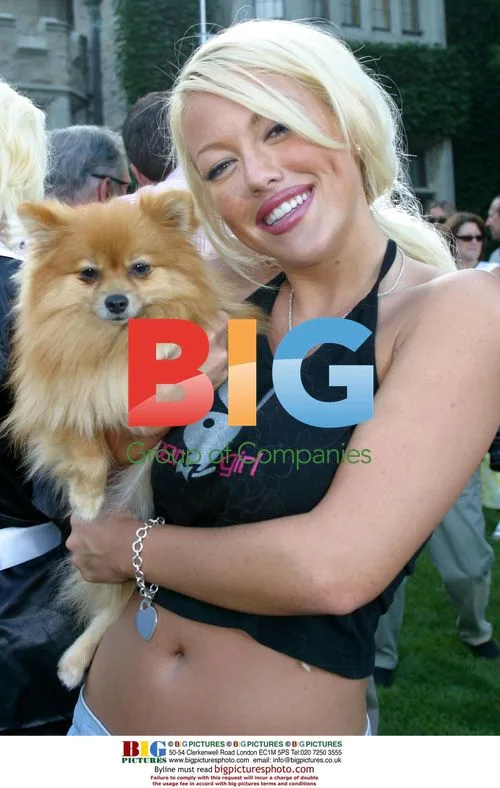 Playmate Tiffany & dog at Playboy Mansion event