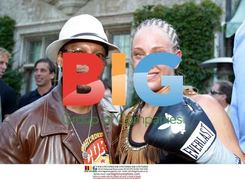 Jessica 'Babydoll' Rakozcy & DL Hughley at Sugar Ray Leonard Boxing Event