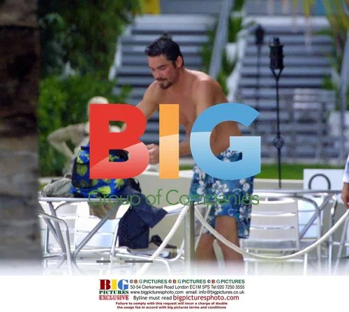 SUPERMAN'S DEAN CAIN PLAYS WITH SON IN MIAMI
