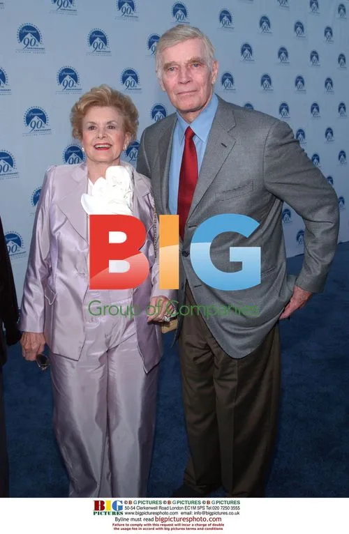 Charlton Heston and wife Lydia arrive at Paramount event